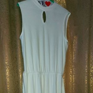 EMI & JOE white jumpsuit polyester, rayon,spandex beautiful for any occasion.
